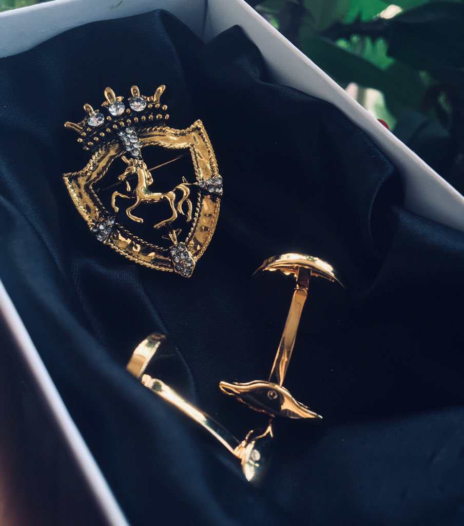 Gold Polo brooch and cufflinks set